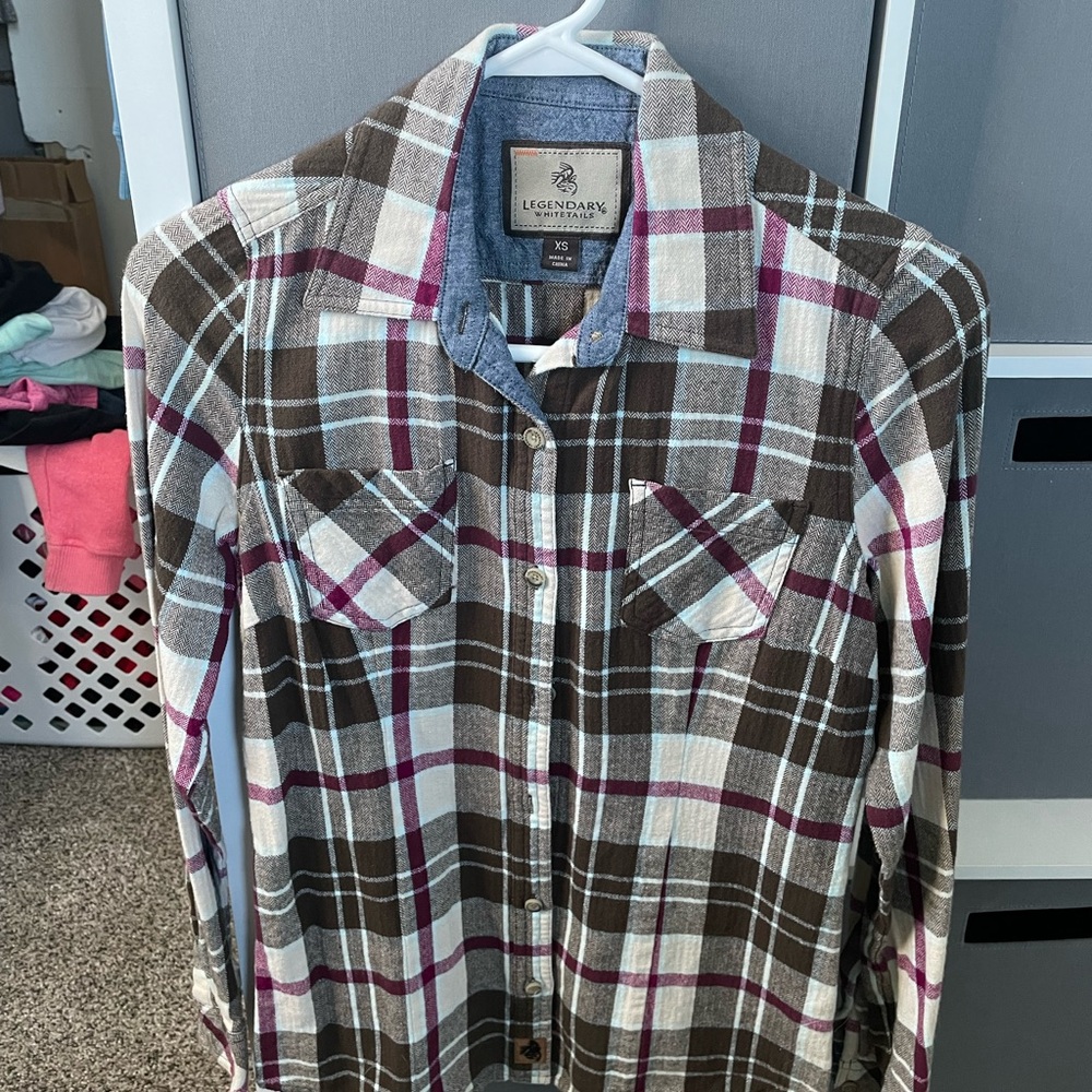 Good condition, Legendary, whitetails flannel.  Size XS